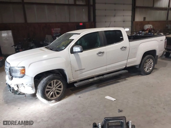 2016 GMC Canyon 4WD SLT with VIN 1GTG6DE31G1284833, listed as a IAAI auction lot 41421843 with 112,593 mi miles. Bid and sale history available at carsss.com. Image 2.