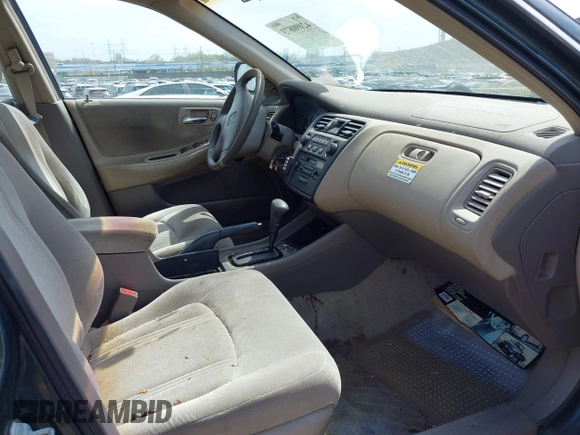 1999 Honda Accord LX with VIN 1HGCG6654XA145126, listed as a IAAI auction lot 42090873 with 76,421 mi miles and . Bid and sale history available at DreamBid. Image 5.
