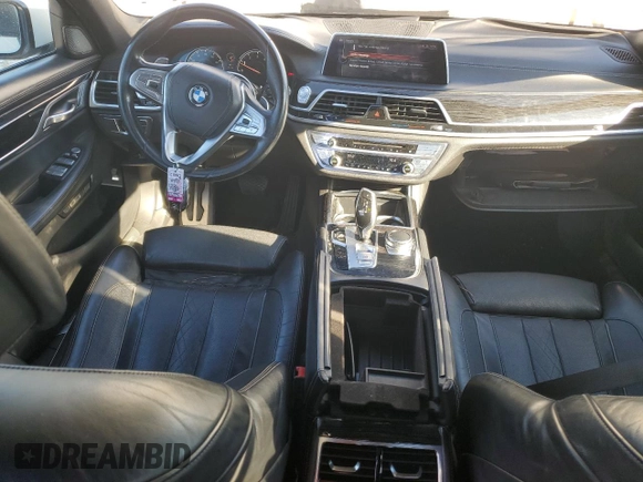 2016 BMW 7 Series 750i with VIN WBA7F0C56GGL99161, listed as a Copart auction lot 87652655 with 97,805 mi miles and Salvage Title. Bid and sale history available at carsss.com. Image 8.