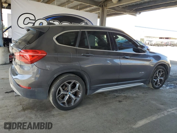 2016 BMW X1 xDrive28i with VIN WBXHT3Z38G4A49061, listed as a Copart auction lot 54010455 with 120,875 mi miles and Salvage Title. Bid and sale history available at DreamBid. Image 3.