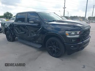 2021 Ram 1500 Laramie z VIN 1C6SRFJT3MN520395, wystawiony jako IAAI lot #42323026 z przebiegiem 52 150 mil mil oraz . Historia ofert i sprzedaży dostępna na DreamBid. Obrazek 1.
