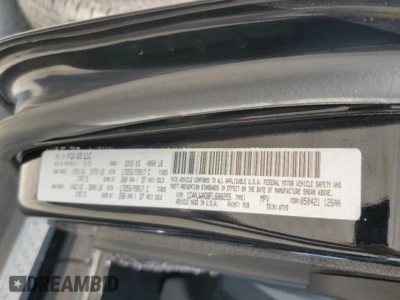 2015 Jeep Wrangler Freedom Edition with VIN 1C4AJWAG8FL688255, listed as a Copart auction lot 59722165 with 130,666 mi miles and Salvage title. Bid and sale history available at DreamBid. Image 13.