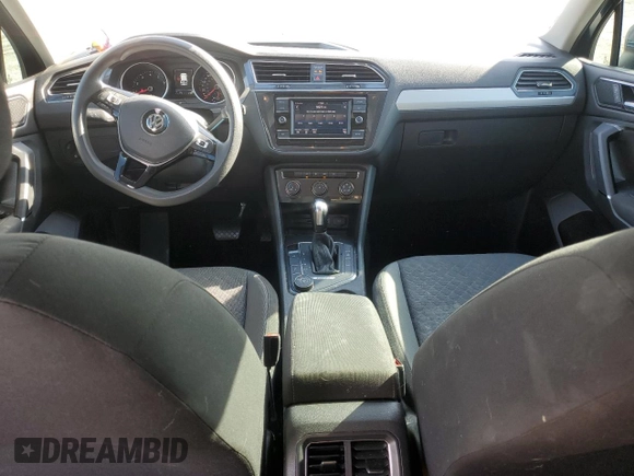 2018 Volkswagen Tiguan S with VIN 3VV0B7AX2JM019924, listed as a Copart auction lot 56138375 with 76,798 mi miles and Salvage title. Bid and sale history available at DreamBid. Image 8.