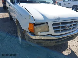 2002 Ford Ranger XL with VIN 1FTYR10D12PB49674, listed as a IAAI auction lot 41732558 with 208,449 mi miles. Bid and sale history available at carsss.com. Image 12.