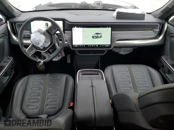 2024 Rivian R1S Adventure z VIN 7PDSGABA7RN034025, wystawiony jako Copart lot #55949335 z przebiegiem 14 429 mil mil oraz Szkody całkowita. Historia ofert i sprzedaży dostępna na DreamBid. Obrazek 8.