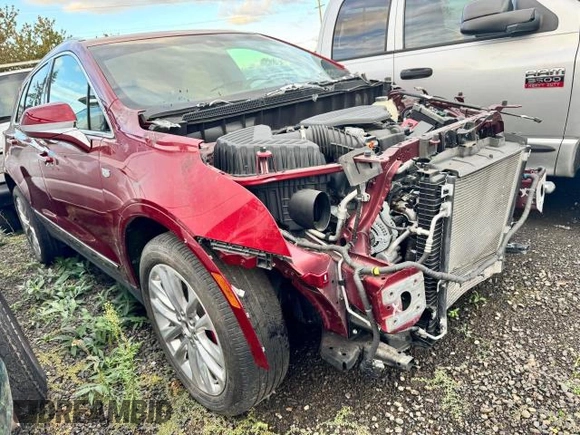 2019 Cadillac XT5 Premium Luxury AWD with VIN 1GYKNFRS2KZ251595, listed as a Copart auction lot 76847104 with 23,925 mi miles and Salvage title. Bid and sale history available at DreamBid. Image 1.
