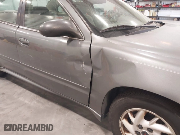 2004 Pontiac Grand Am SE1 with VIN 1G2NF52E74C256591, listed as a IAAI auction lot 41783877 with 181,610 mi miles. Bid and sale history available at carsss.com. Image 6.