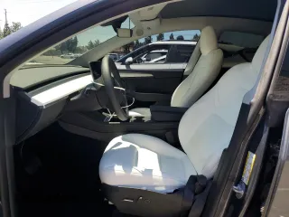 2024 Tesla Model Y Long Range with VIN 7SAYGDEEXRA215975, listed as a Copart auction lot 56705585 with 20,554 mi miles and Salvage Title. Bid and sale history available at DreamBid. Image 7.