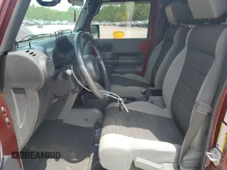 2007 Jeep Wrangler Unlimited X with VIN 1J4GA39187L161451, listed as a Copart auction lot 55280905 with 214,660 mi miles and Salvage Title. Bid and sale history available at DreamBid. Image 7.
