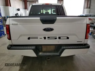2015 Ford F-150 XLT with VIN 1FTEW1C84FKE47844, listed as a Copart auction lot 50348595 with 137,916 mi miles and Salvage Title. Bid and sale history available at carsss.com. Image 6.