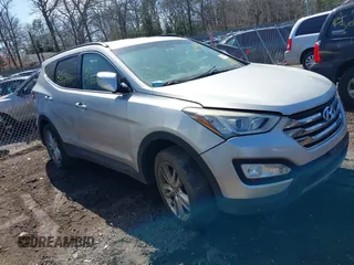 2013 Hyundai Santa Fe Sport z VIN 5XYZUDLA4DG057020, wystawiony jako IAAI lot #41942762 z przebiegiem Nie podano mil oraz . Historia ofert i sprzedaży dostępna na DreamBid. Obrazek 1.