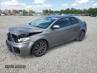 2012 Kia Forte SX с VIN KNAFW6A34C5481086, выставлен на аукционе Copart как лот 57241265 с пробегом 117 233 миль миль и Списание • Salvage title. История ставок и продаж доступна на DreamBid. Изображение 1.