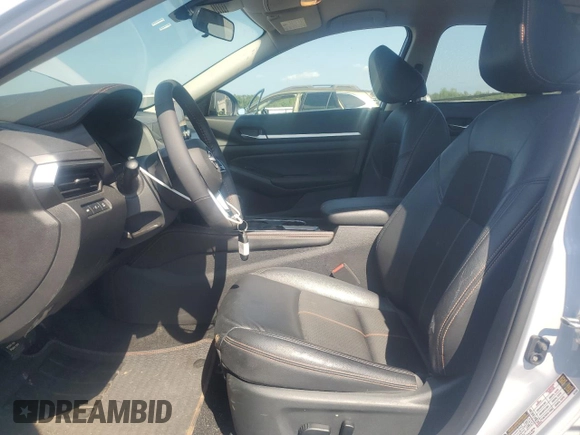 2024 Nissan Altima SR with VIN 1N4BL4CV7RN398845, listed as a Copart auction lot 62087945 with 20,410 mi miles and Salvage title. Bid and sale history available at DreamBid. Image 7.