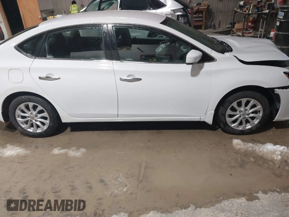 2019 Nissan Sentra S z VIN 3N1AB7APXKY240431, wystawiony jako IAAI lot #41722182 z przebiegiem 81 450 mil mil oraz . Historia ofert i sprzedaży dostępna na DreamBid. Obrazek 13.