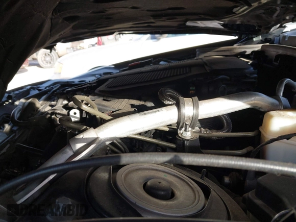 2013 Mercedes-Benz SLK-Class SLK 350 with VIN WDDPK5HA6DF054060, listed as a IAAI auction lot 41797807 with 84,877 mi miles. Bid and sale history available at carsss.com. Image 10.