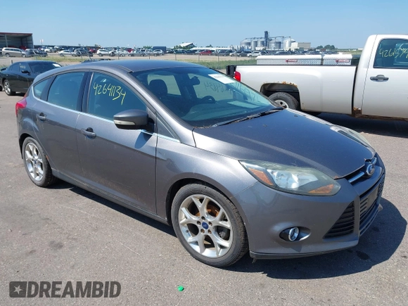 2014 Ford Focus Titanium with VIN 1FADP3N22EL317007, listed as a IAAI auction lot 42641134 with 159,705 mi miles and . Bid and sale history available at DreamBid. Image 1.