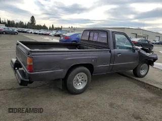 1988 Toyota Pickup z VIN JT4RN50R1J5149025, wystawiony jako Copart lot #41651215 z przebiegiem 263 997 mil mil oraz Szkoda całkowita • Salvage title. Historia ofert i sprzedaży dostępna na DreamBid. Obrazek 3.