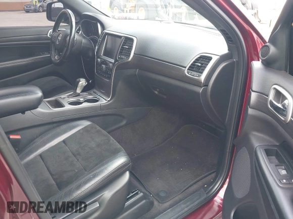 2017 Jeep Grand Cherokee Laredo with VIN 1C4RJFAG3HC701869, listed as a IAAI auction lot 42720101 with 67,311 mi miles and . Bid and sale history available at DreamBid. Image 5.