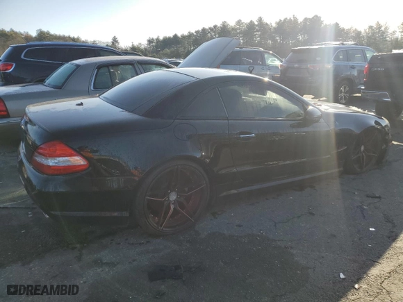 2009 Mercedes-Benz SL-Class V8 with VIN WDBSK71FX9F153802, listed as a Copart auction lot 83872604 with 0 mi miles and Salvage Title. Bid and sale history available at carsss.com. Image 3.