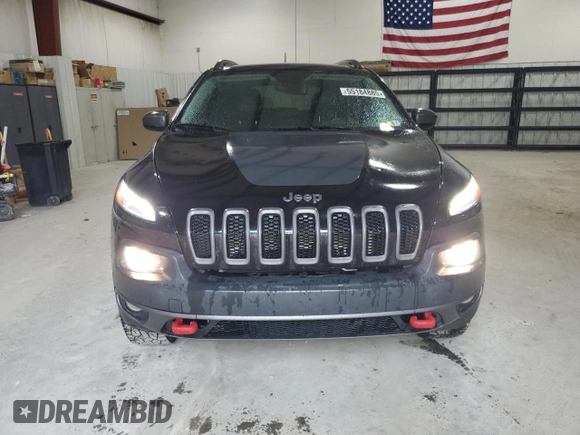 2016 Jeep Cherokee Trailhawk with VIN 1C4PJMBS7GW337774, listed as a Copart auction lot 55184885 with 161,567 mi miles and Salvage title. Bid and sale history available at DreamBid. Image 5.