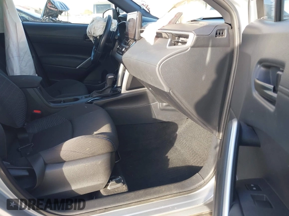2023 Toyota Corolla Cross Hybrid S with VIN 7MUFBABG8PV011345, listed as a IAAI auction lot 41286619 with 13,518 mi miles and . Bid and sale history available at DreamBid. Image 5.