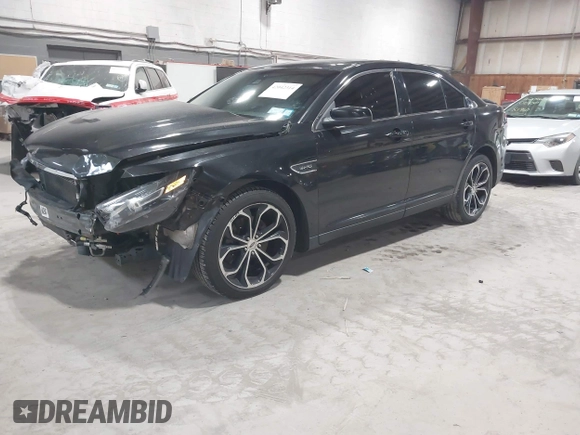 2015 Ford Taurus SHO with VIN 1FAHP2KT0FG132988, listed as a IAAI auction lot 42042314 with 192,974 mi miles and . Bid and sale history available at DreamBid. Image 18.
