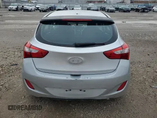 2014 Hyundai Elantra GT with VIN KMHD35LH8EU196479, listed as a Copart auction lot 61127244 with 0 mi miles and Salvage Title. Bid and sale history available at carsss.com. Image 6.