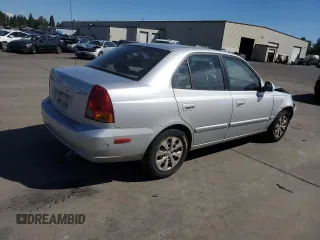 2005 Hyundai Accent GLS with VIN KMHCG45C55U623340, listed as a Copart auction lot 59587304 with 275,364 mi miles and Salvage Title. Bid and sale history available at carsss.com. Image 3.