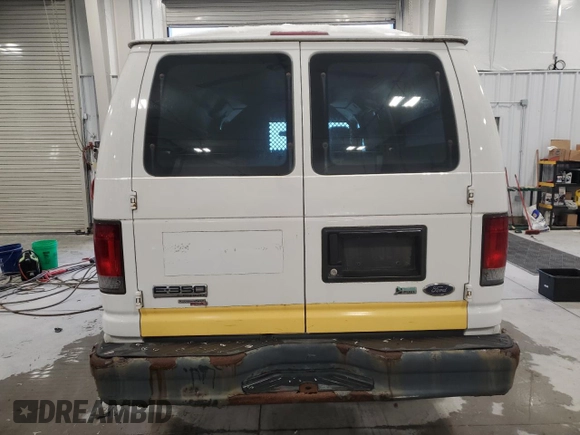 2011 Ford Econoline Cargo Commercial with VIN 1FTSE3EL2BDA90777, listed as a Copart auction lot 79910354 with 246,931 mi miles and Clean Title. Bid and sale history available at carsss.com. Image 6.