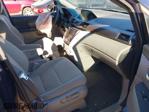 2017 Honda Odyssey SE with VIN 5FNRL5H31HB016523, listed as a IAAI auction lot 40998811 with 62,690 mi miles and . Bid and sale history available at carsss.com. Image 5.