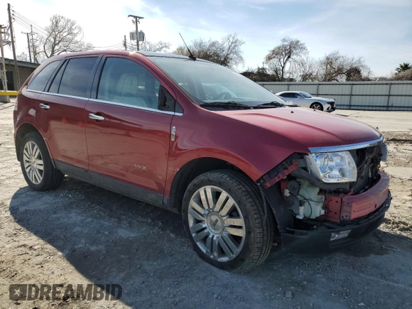 2010 Lincoln MKX with VIN 2LMDJ8JC2ABJ31128, listed as a Copart auction lot 41861205 with 56,661 mi miles and Salvage Title. Bid and sale history available at DreamBid. Image 4.