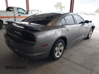 2011 Dodge Charger Rallye with VIN 2B3CL3CGXBH607876, listed as a IAAI auction lot 41778597 with 125,680 mi miles. Bid and sale history available at carsss.com. Image 4.