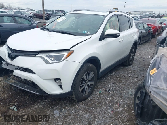2018 Toyota RAV4 XLE with VIN JTMRFREV8JJ225065, listed as a IAAI auction lot 41940678 with 145,074 mi miles. Bid and sale history available at carsss.com. Image 2.