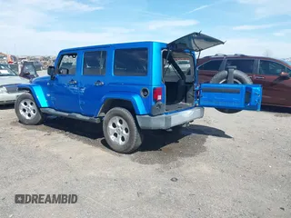 2015 Jeep Wrangler Unlimited Sahara z VIN 1C4HJWEG5FL650829, wystawiony jako IAAI lot #41824739 z przebiegiem 127 719 mil mil oraz . Historia ofert i sprzedaży dostępna na DreamBid. Obrazek 3.