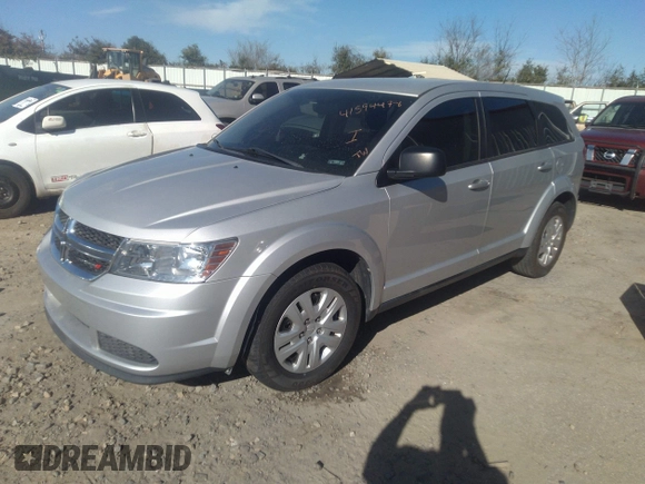 2014 Dodge Journey American Value Pkg with VIN 3C4PDCAB2ET186199, listed as a IAAI auction lot 41594478 with 145,936 mi miles. Bid and sale history available at carsss.com. Image 2.