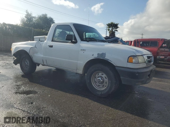 2002 Mazda B-Series Truck SX with VIN 4F4YR12D82TM01061, listed as a Copart auction lot 49449545 with Not Provided miles and Non Repairable. Bid and sale history available at DreamBid. Image 4.