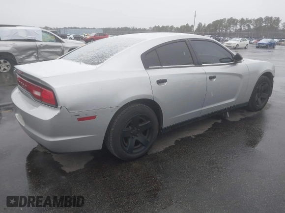 2014 Dodge Charger Police with VIN 2C3CDXAG1EH282873, listed as a IAAI auction lot 41272037 with 133,502 mi miles and . Bid and sale history available at DreamBid. Image 4.