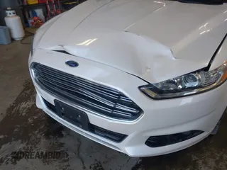 2016 Ford Fusion Titanium z VIN 3FA6P0D93GR116355, wystawiony jako IAAI lot #42158991 z przebiegiem 59 602 mil mil oraz . Historia ofert i sprzedaży dostępna na DreamBid. Obrazek 6.