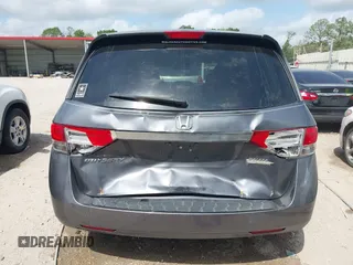 2014 Honda Odyssey EX-L with VIN 5FNRL5H69EB075115, listed as a IAAI auction lot 42046386 with 200,340 mi miles and . Bid and sale history available at carsss.com. Image 6.
