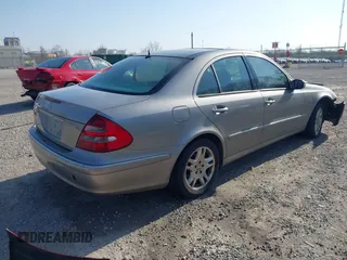 2003 Mercedes-Benz E-Class 3.2L with VIN WDBUF65J93X099223, listed as a IAAI auction lot 42033473 with 230,758 mi miles. Bid and sale history available at carsss.com. Image 4.