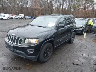 2014 Jeep Grand Cherokee Laredo with VIN 1C4RJFAG7EC119978, listed as a IAAI auction lot 41161797 with 140,823 mi miles. Bid and sale history available at carsss.com. Image 2.