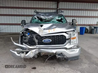 2021 Ford F-150 XL z VIN 1FTFW1E89MFC21046, wystawiony jako IAAI lot #42668472 z przebiegiem 83 083 mil mil oraz . Historia ofert i sprzedaży dostępna na DreamBid. Obrazek 6.