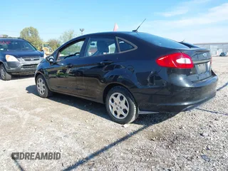2011 Ford Fiesta SE with VIN 3FADP4BJ4BM144991, listed as a IAAI auction lot 42202406 with 67,448 mi miles and . Bid and sale history available at carsss.com. Image 3.