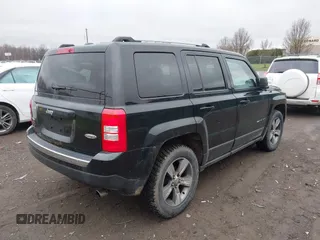 2016 Jeep Patriot Latitude with VIN 1C4NJRFB1GD523904, listed as a IAAI auction lot 42017736 with 164,705 mi miles. Bid and sale history available at carsss.com. Image 4.
