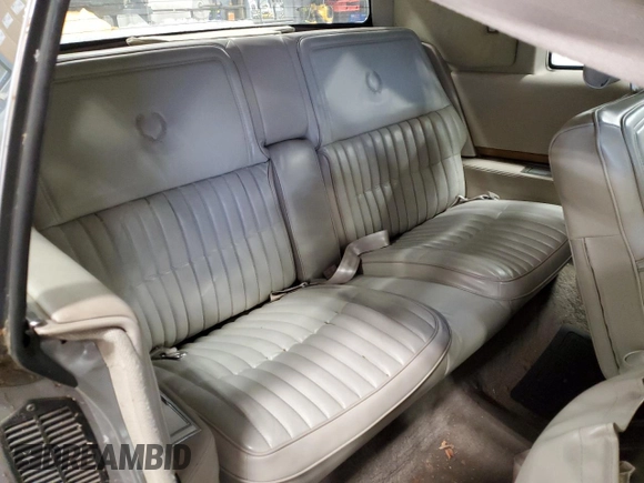 1984 Cadillac Eldorado z VIN 1G6AL5785EE630873, wystawiony jako Copart lot #82896404 z przebiegiem 3 839 mil mil oraz Czysty tytuł • Clean title. Historia ofert i sprzedaży dostępna na DreamBid. Obrazek 10.