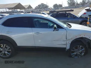 2024 Mazda CX-30 S Premium with VIN 3MVDMBDM4RM616159, listed as a IAAI auction lot 42328334 with 4,614 mi miles and . Bid and sale history available at DreamBid. Image 13.
