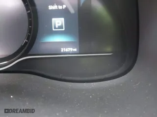 2021 Hyundai Kona Electric Ultimate with VIN KM8K53AG0MU108118, listed as a IAAI auction lot 41247324 with 21,679 mi miles. Bid and sale history available at carsss.com. Image 7.