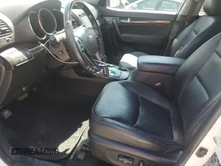 2013 Kia Sorento SX with VIN 5XYKW4A22DG383003, listed as a Copart auction lot 64064245 with 154,450 mi miles and Salvage title. Bid and sale history available at DreamBid. Image 7.