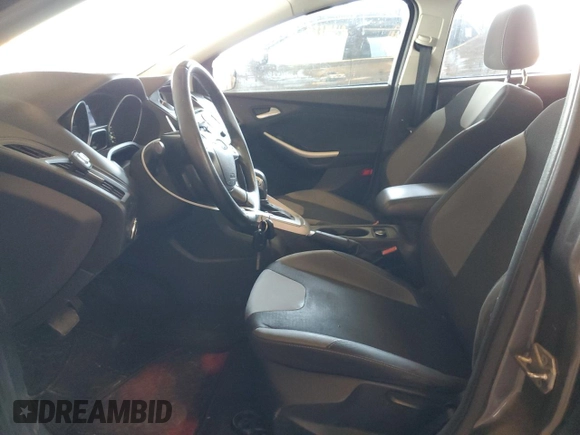 2012 Ford Focus SE with VIN 1FAHP3F28CL114572, listed as a Copart auction lot 63053035 with 142,994 mi miles and Salvage title. Bid and sale history available at DreamBid. Image 7.