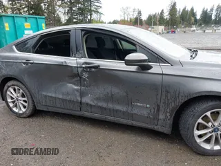2019 Ford Fusion SE with VIN 3FA6P0LU6KR272193, listed as a IAAI auction lot 41993485 with 132,845 mi miles and . Bid and sale history available at DreamBid. Image 6.